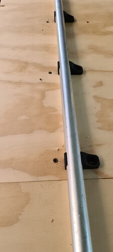 pole screws removed, threaded inserts showing