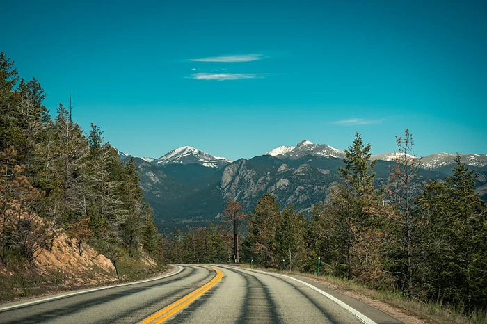 Trail Ridge Road climbs above the tree line to more than 12,000 feet, making it the highest continuous paved road in the United States and one of Rocky Mountain National Park's signature experiences.